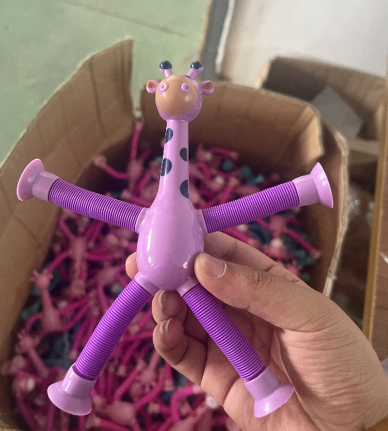 Giraffe Tubes Sensory Spring Stretch Squeeze Toy โ photo 2