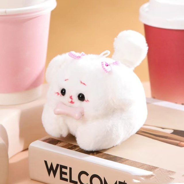 Lil' White Pup With a Bone Keychain