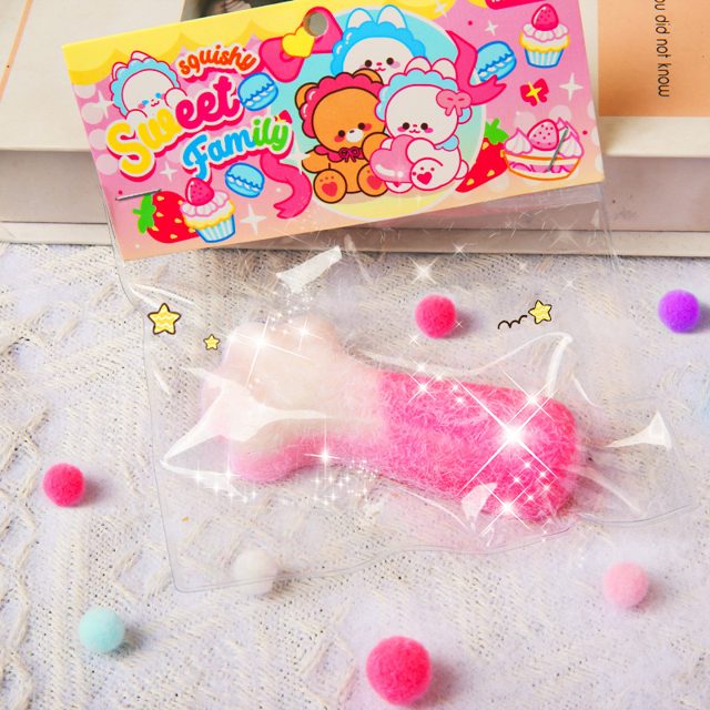 Fuzzy Pink Fish Stick Squishy Bag