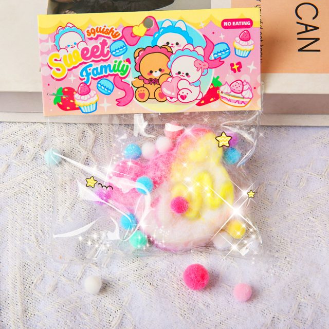 Fuzzy Rainbow Birdie Squishy
