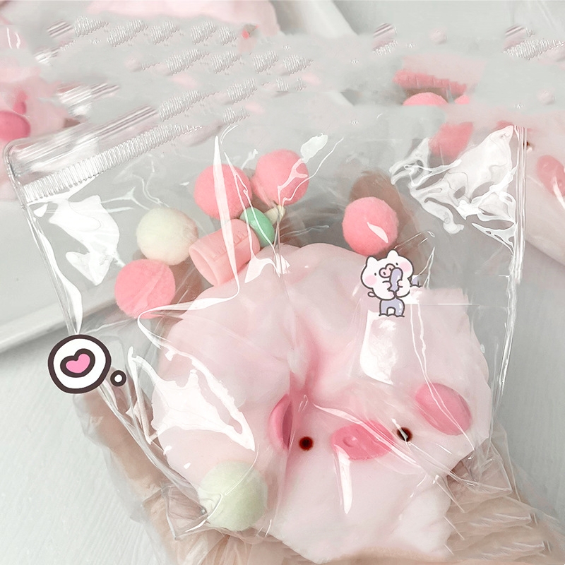 Bubbly Pink Piggy Grape Squish Ball — photo 2