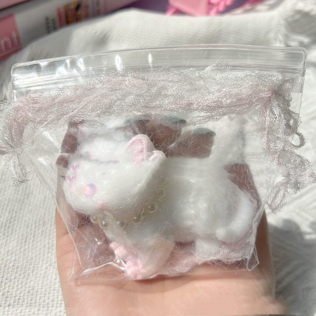 Fuzzy Flocked Kitty in a Bow Bag โ photo 2