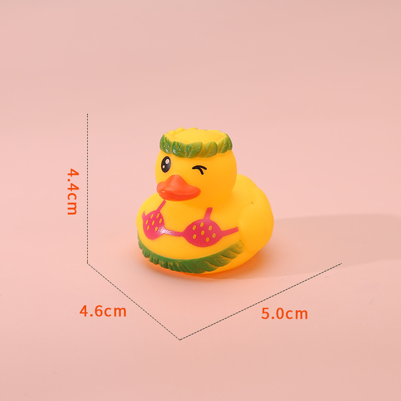 Vinyl Christmas Antlers Yellow Duck Toy โ photo 4