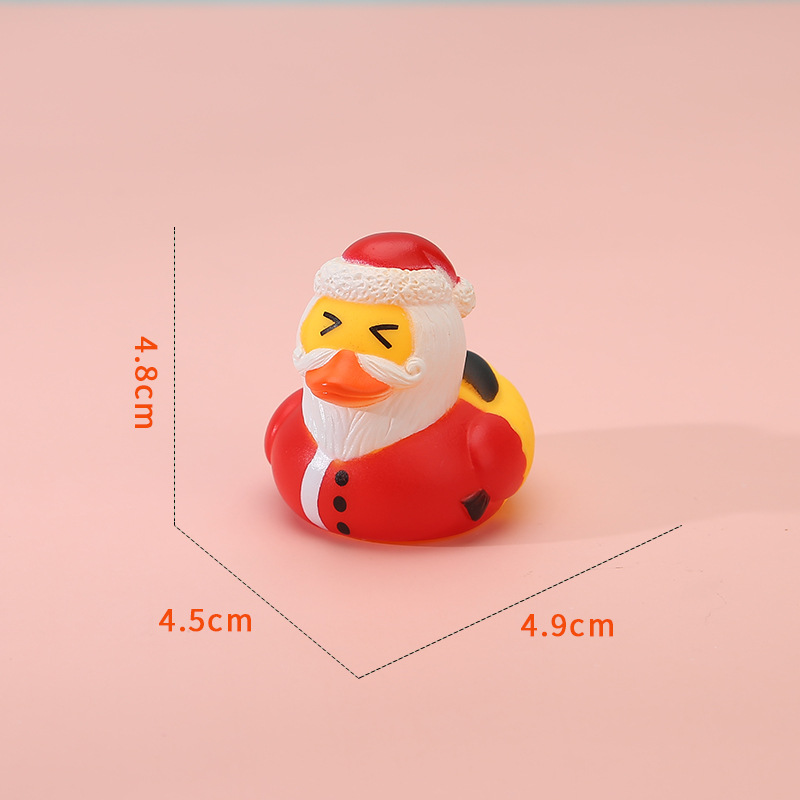 Vinyl Christmas Antlers Yellow Duck Toy โ photo 3
