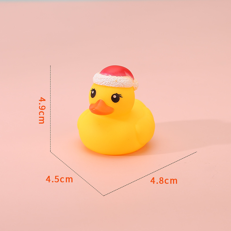 Vinyl Christmas Antlers Yellow Duck Toy โ photo 2